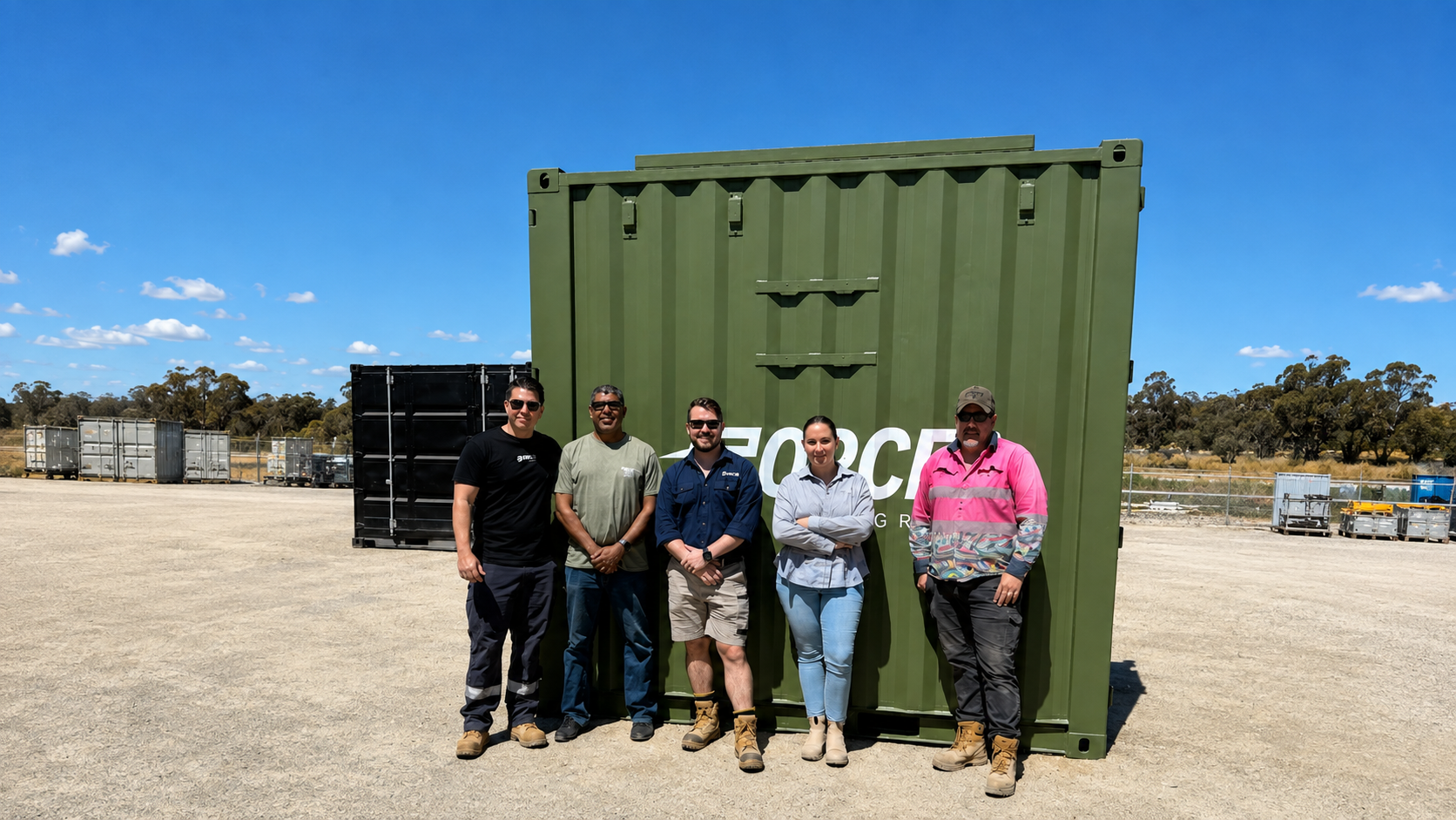 FORCES delivery team in front of a Rapid deployable system on the ADF / PNG Defence Cooperation Program